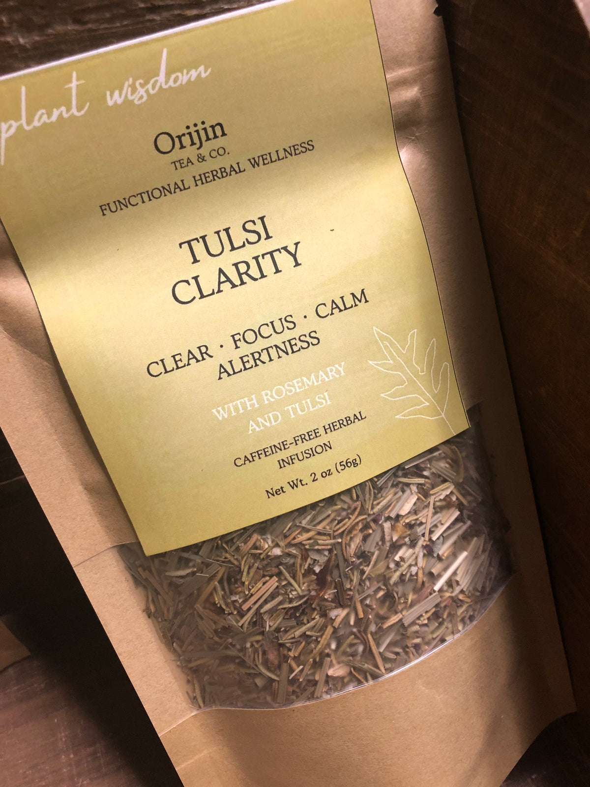 Tulsi Clarity caffeine-free loose-leaf herbal tea with rosemary and Kapoor tulsi in Orijin Téa & Co. packaging.